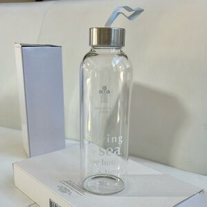 Lakeshore Hotel branded glass water bottle